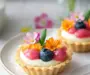 Delightful Mini Spring Cheesecake Tarts with Colorful Touches