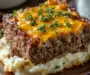 Melt-in-Your-Mouth Meatloaf with Mashed Potatoes and Cheese